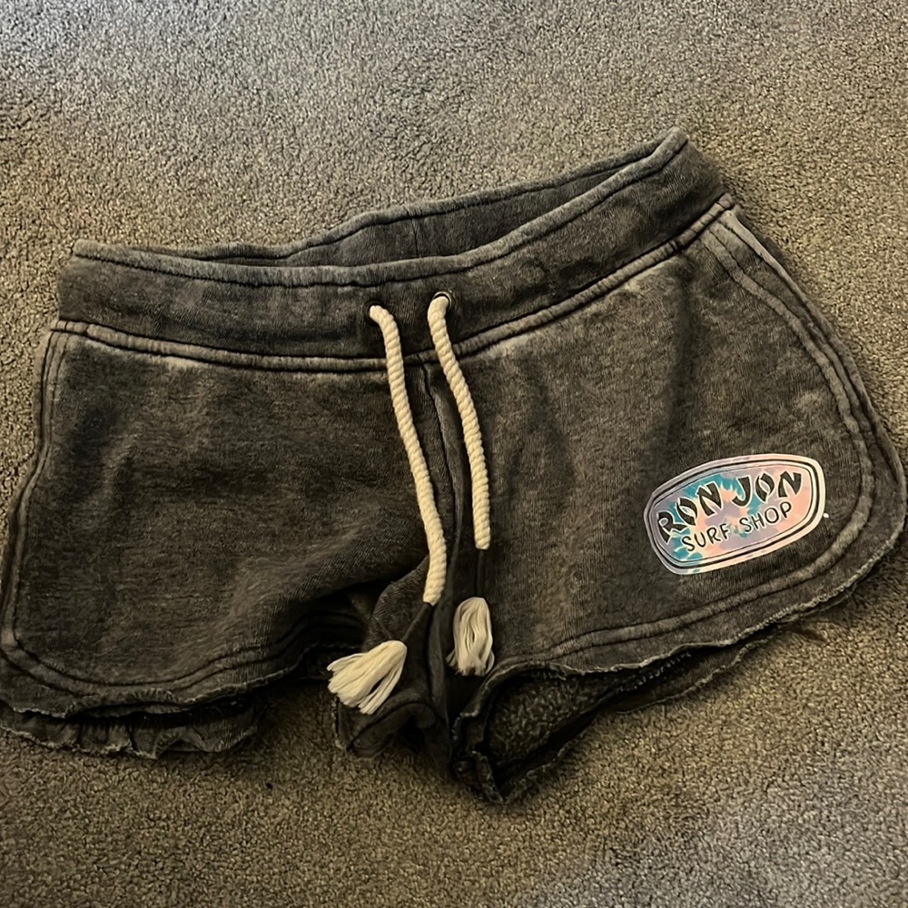 This is a pair of Ron Jon surf shop shorts that have not been worn once.